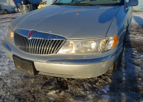 2000 Lincoln Continental z USA, uszkodzony, nr VIN 1LNHM97VXYY900328